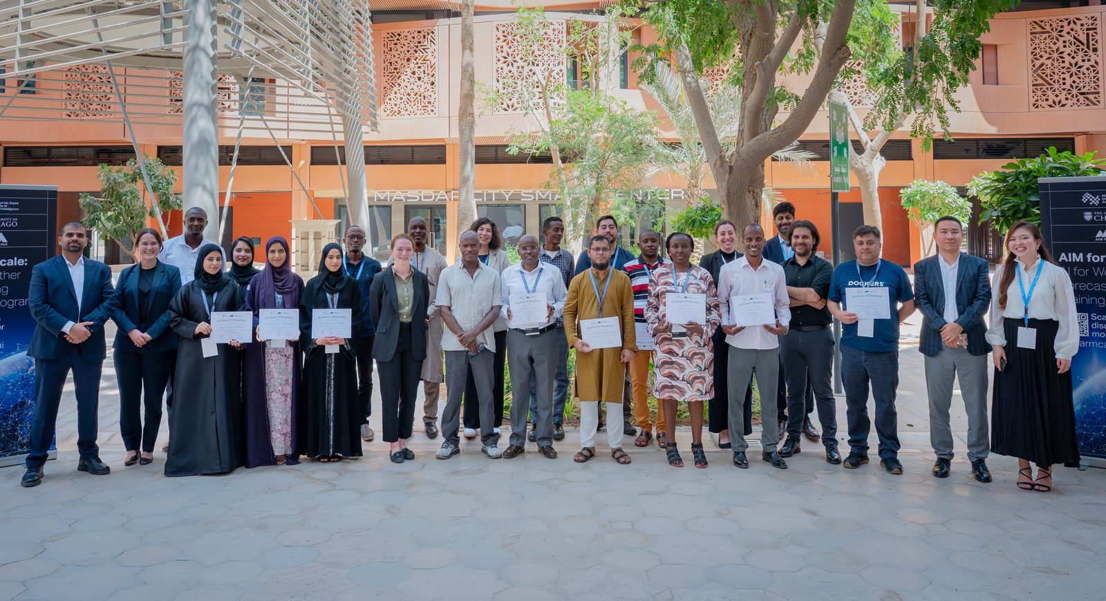 The 2025 cohort with their certificates at MBZUAI, Abu Dhabi